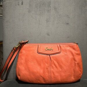 Coach Pink Wristlet with Modern Design